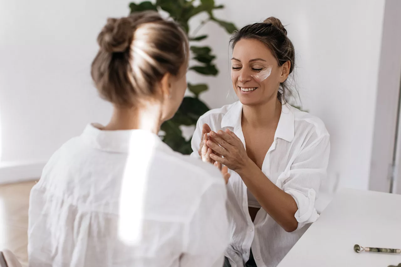 li-women-applying-moisturiser-emea
